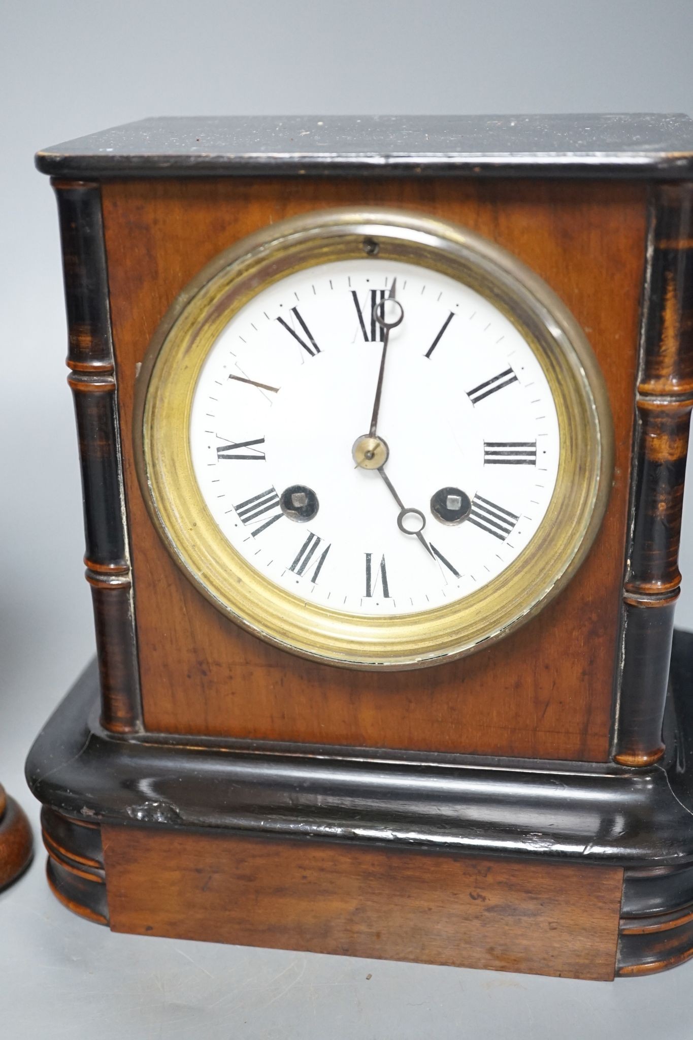 A Victorian walnut clock and an Art Deco walnut clock